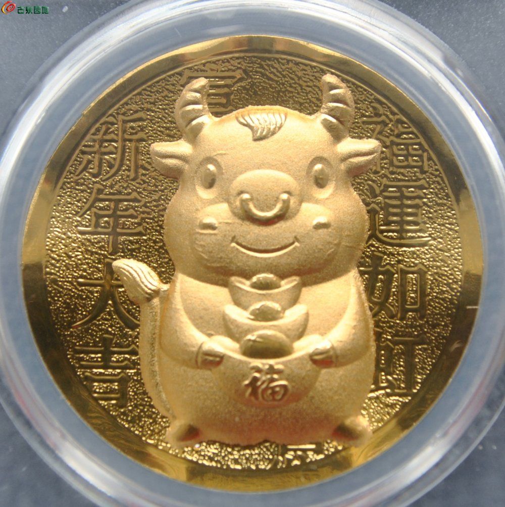 评级0.3克纯金立体金牛送元宝纪念章局1.jpg