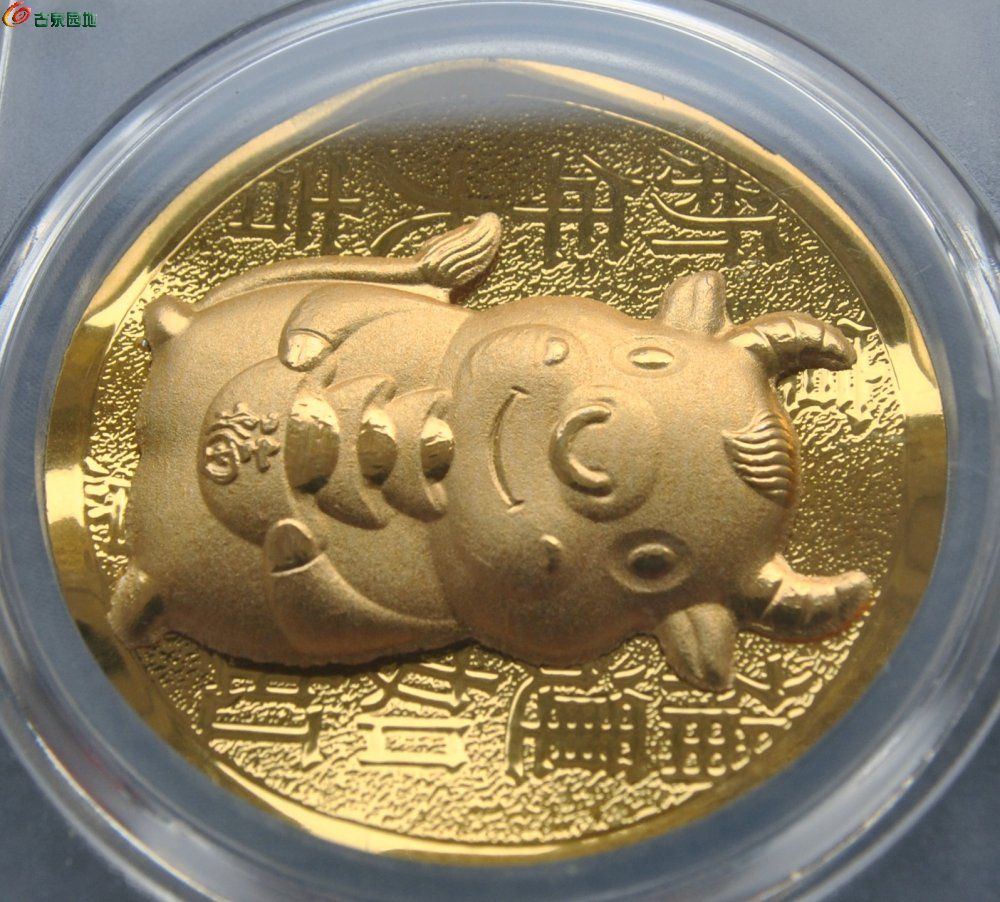 评级0.3克纯金立体金牛送元宝纪念章局3.jpg